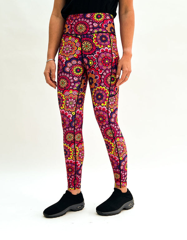 Colorful retro floral gym leggings with high waistband and side pockets, designed for comfort and activewear style