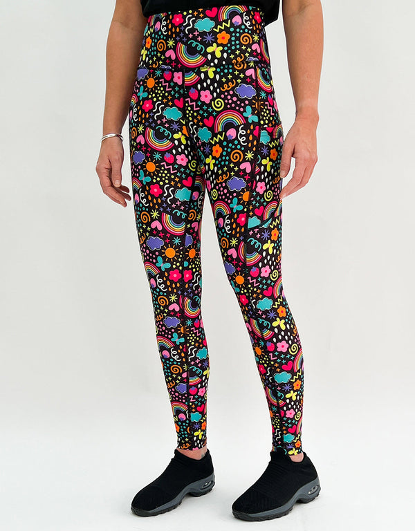 Colorful Over The Rainbow gym leggings with high-rise waistband and side pockets for activewear.