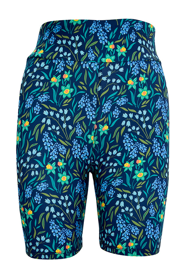 blue tight shorts with daffodil and spring floral pattern, elastic waistband, comfortable and breathable design